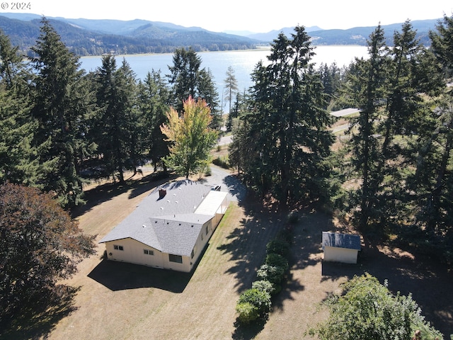 aerial view featuring a water and mountain view