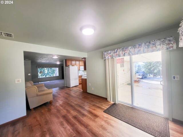 living room with dark wood-type flooring