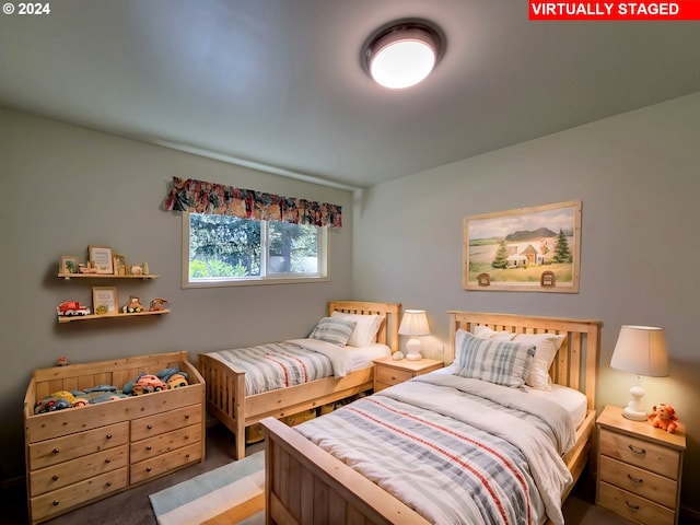 bedroom featuring carpet