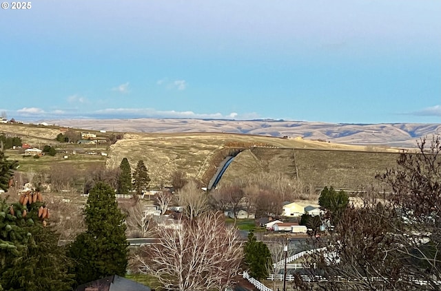 view of mountain feature featuring a rural view