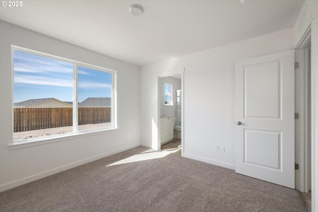 152 SW Eagle Dr, Boardman, OR 97818 - kitchen with stainless steel appliances, a chandelier, white cabinets, baseboards, and a center island