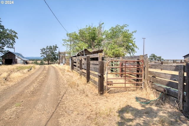 view of road featuring a rural view