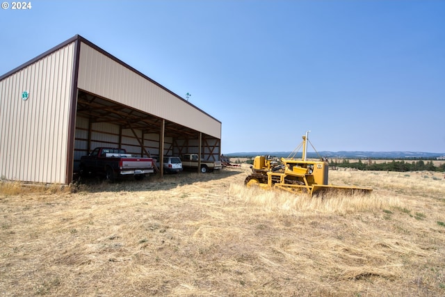 exterior space with a rural view