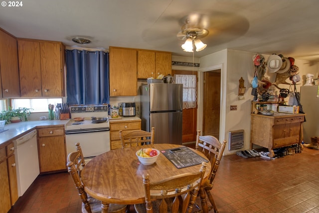 kitchen with white appliances and ceiling fan