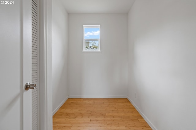 spare room with light hardwood / wood-style floors