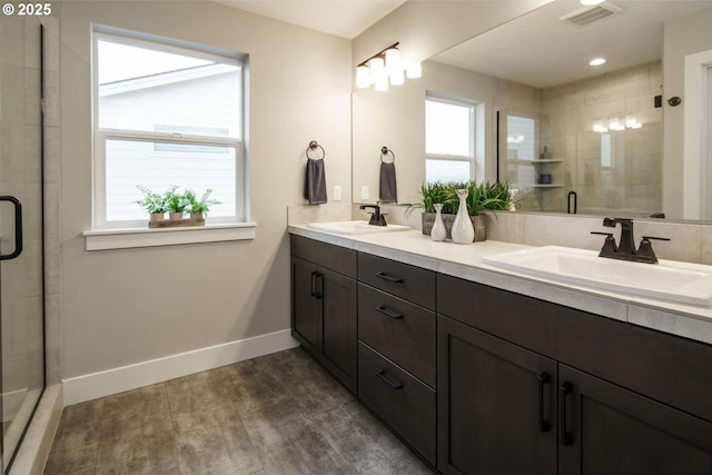 bathroom with vanity, hardwood / wood-style floors, and an enclosed shower