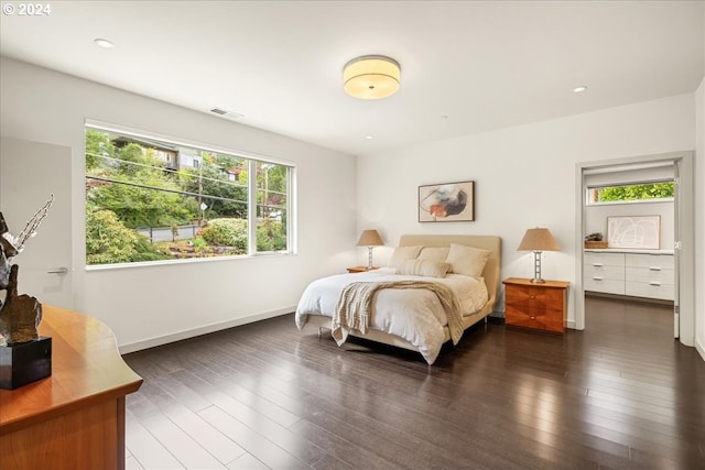 bedroom featuring dark hardwood / wood-style floors