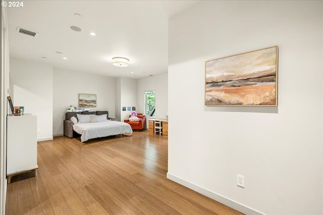 bedroom with light wood-type flooring