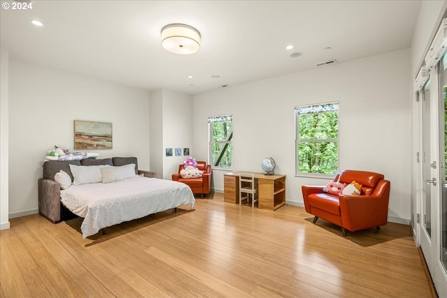 bedroom featuring light hardwood / wood-style floors