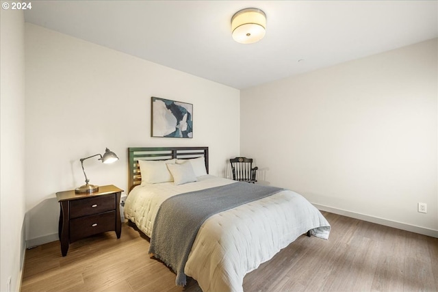 bedroom featuring light hardwood / wood-style flooring