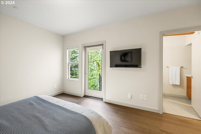 bedroom featuring hardwood / wood-style flooring