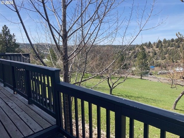 deck featuring a yard