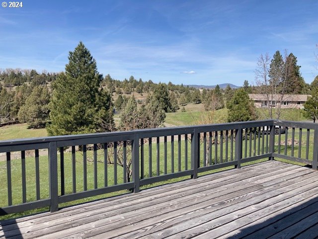 deck featuring a lawn