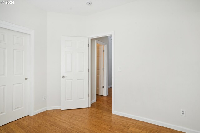 unfurnished bedroom with light hardwood / wood-style flooring