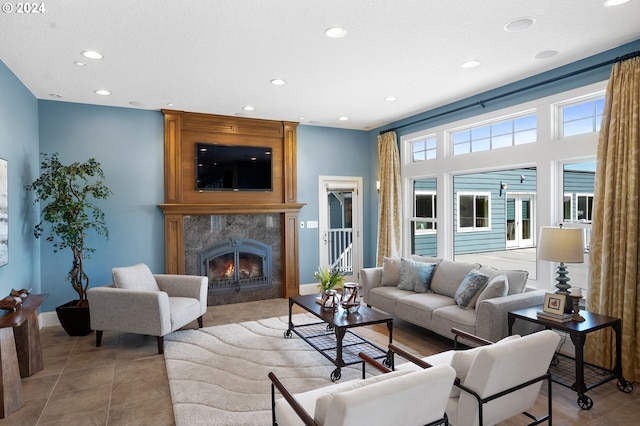 tiled living room featuring a fireplace