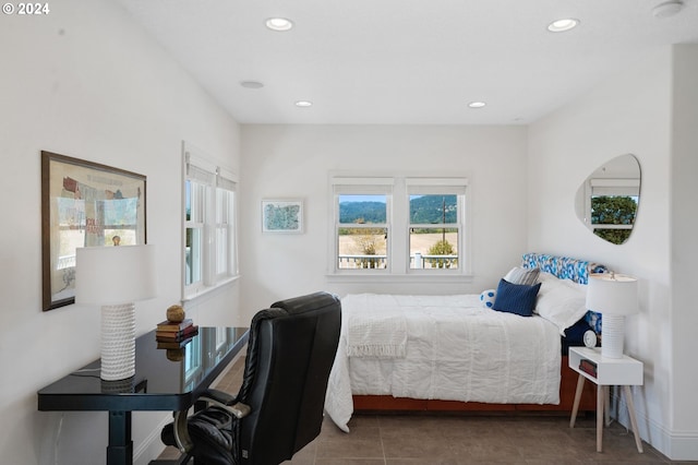 bedroom featuring tile patterned floors, recessed lighting, and baseboards