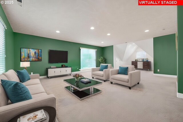 bedroom featuring light colored carpet and a closet