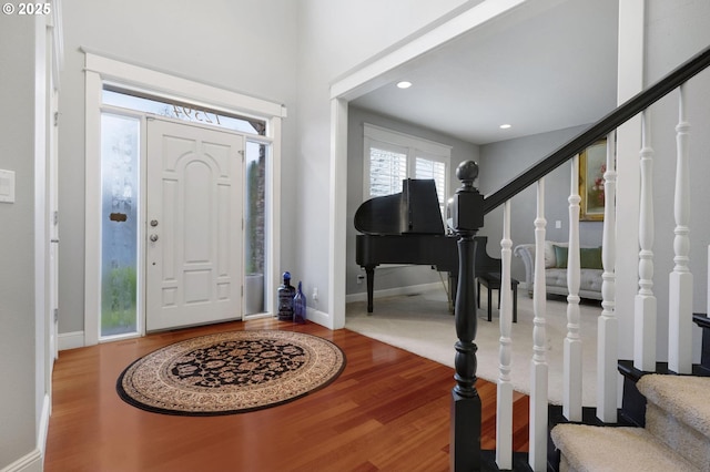 foyer entrance featuring wood-type flooring