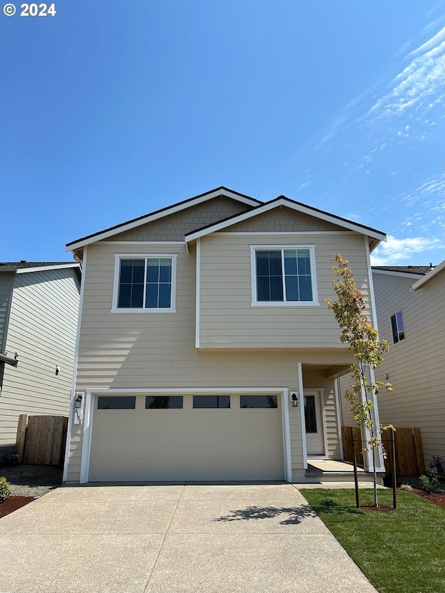 view of front of property featuring a garage