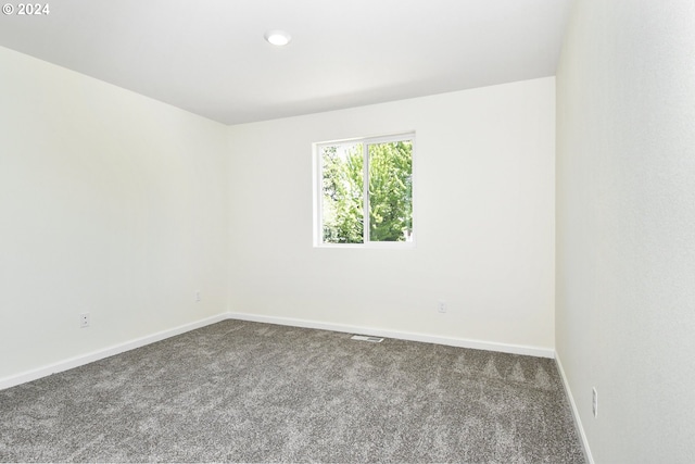 unfurnished room with carpet floors