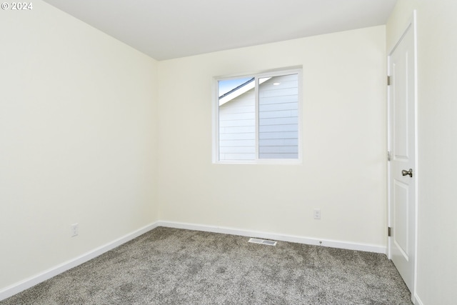 empty room featuring carpet