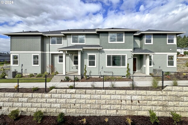 view of front of house with cooling unit