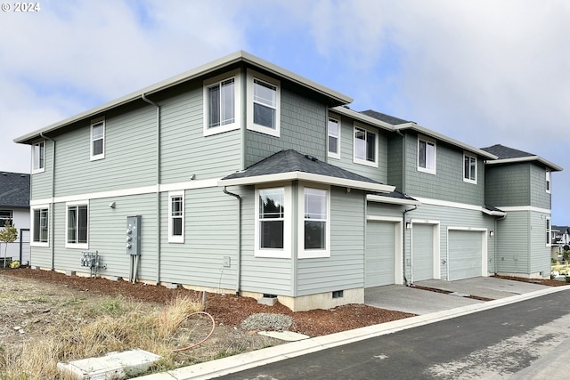 exterior space with a garage