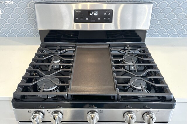 room details with stainless steel gas range oven