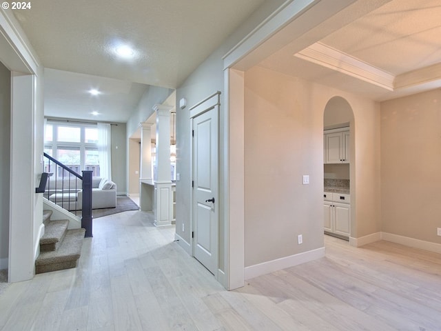 hallway with light wood-type flooring