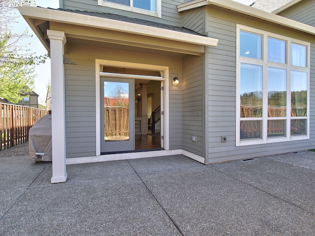 doorway to property featuring a patio