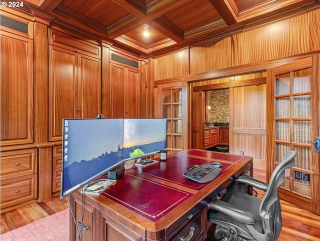 office with coffered ceiling, wood ceiling, beamed ceiling, wooden walls, and light hardwood / wood-style floors