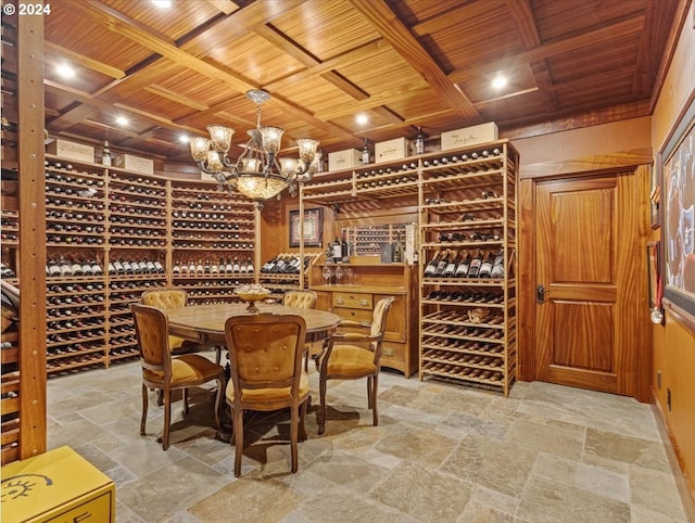 wine room featuring an inviting chandelier and wood ceiling