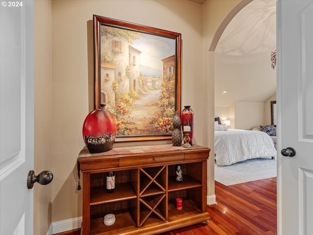 corridor featuring hardwood / wood-style flooring