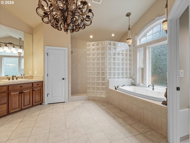 bathroom with vanity, lofted ceiling, independent shower and bath, and tile patterned flooring