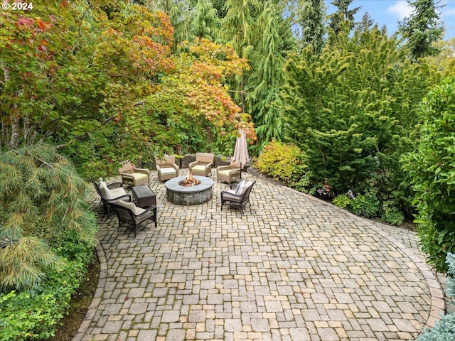 view of patio featuring a fire pit