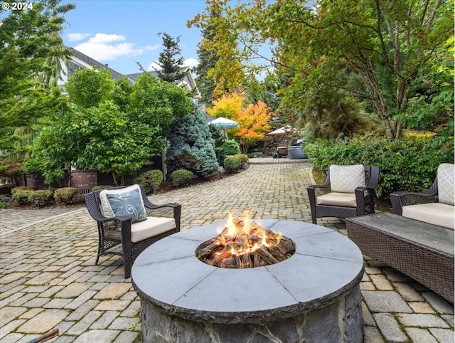 view of patio featuring a fire pit