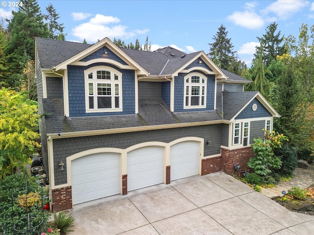 view of front of property with a garage