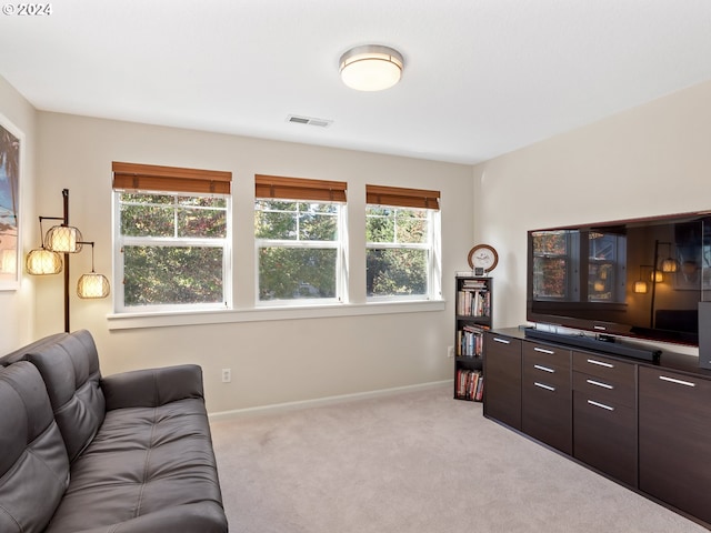 living room featuring light colored carpet