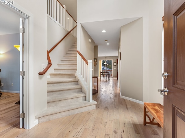 entryway with light hardwood / wood-style flooring