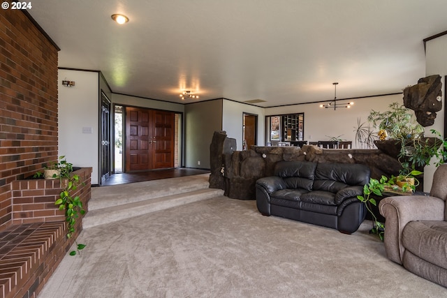 carpeted living room featuring a notable chandelier and crown molding