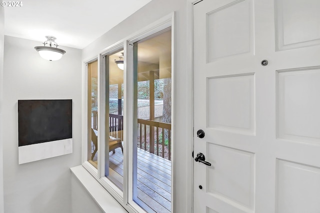 doorway to outside featuring plenty of natural light