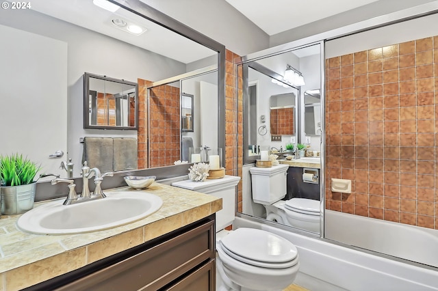 full bathroom featuring vanity, toilet, and enclosed tub / shower combo