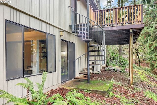 view of side of home featuring central AC