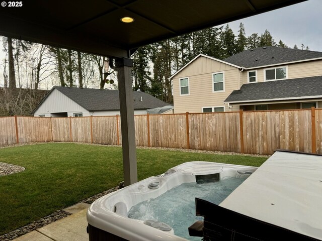 view of exterior entry featuring covered porch and a garage