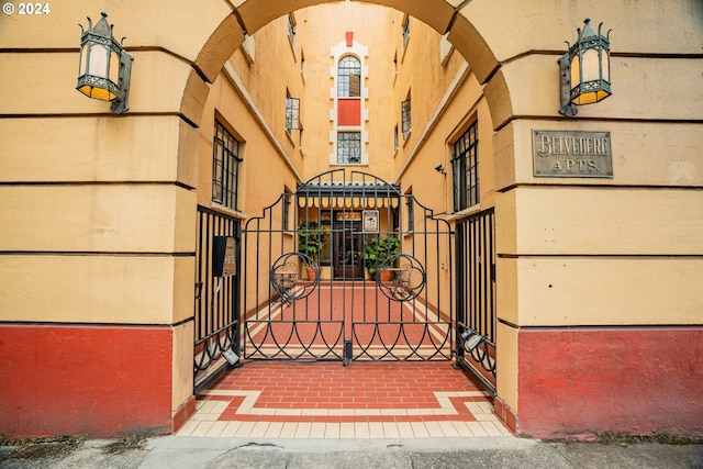 view of gate featuring fence