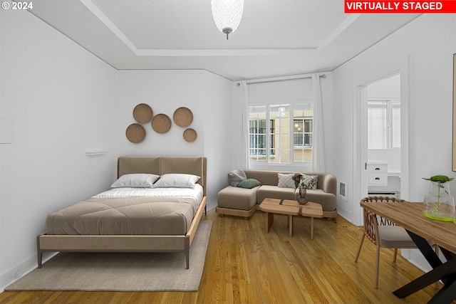 bedroom featuring light wood-type flooring