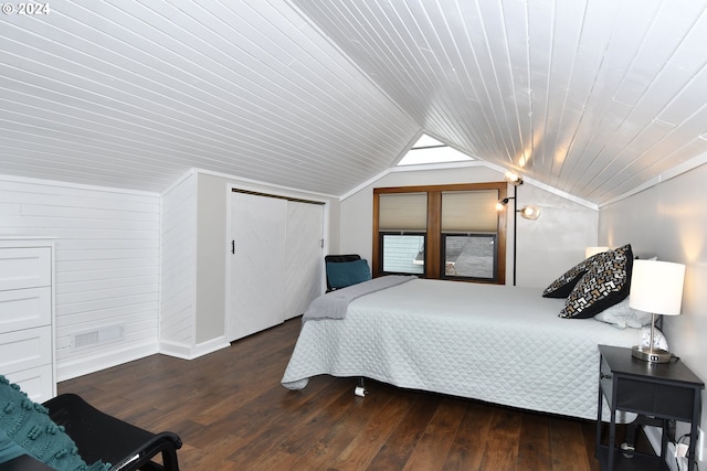 bedroom featuring dark hardwood / wood-style flooring, wooden ceiling, and vaulted ceiling