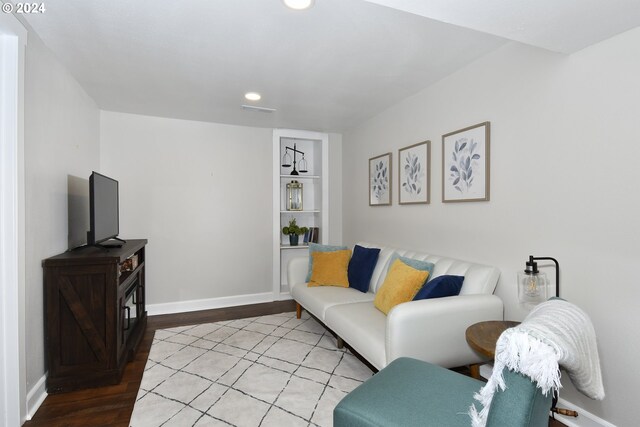 living room with light hardwood / wood-style floors