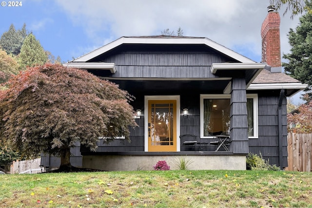 view of front of home with a front yard