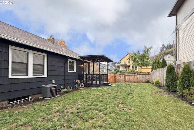 view of yard featuring central AC